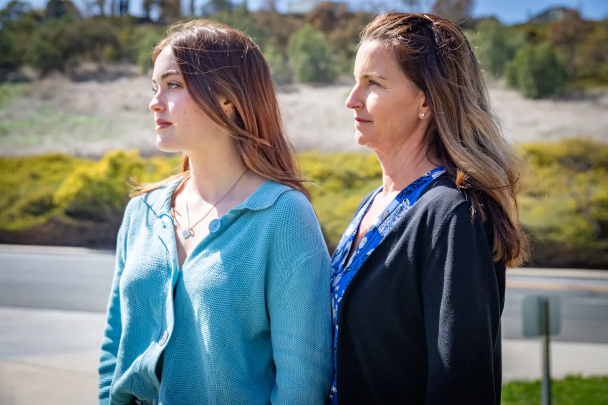 Mission Viejo High School Student Natalie Moreta stands with her mother, Sarah Moreta, in Laguna Niguel, Calif., on March 22, 2021. (John Fredricks/The Epoch Times)