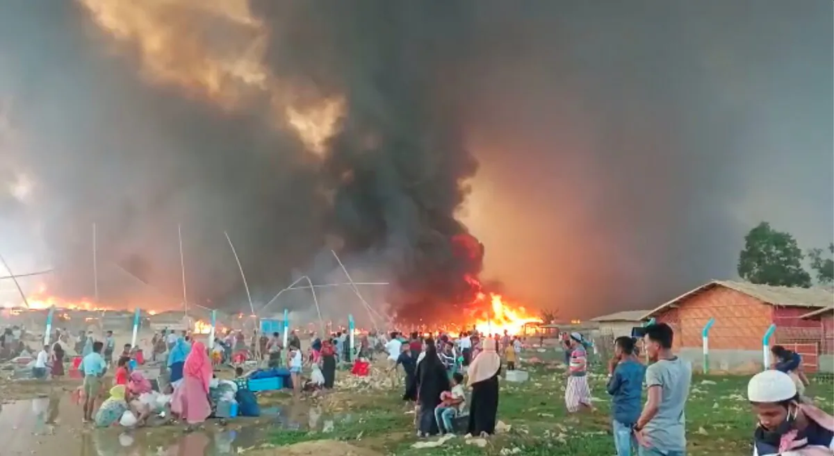 A fire at a Balukhali refugee camp in Cox's Bazar, Bangladesh, on March 22, 2021. (Courtesy of Rohingya Right Team/MD Arakani/Handout via Reuters)