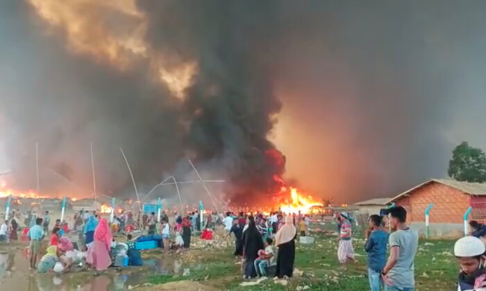 A fire at a Balukhali refugee camp in Cox's Bazar, Bangladesh, on March 22, 2021. (Courtesy of Rohingya Right Team/MD Arakani/Handout via Reuters)