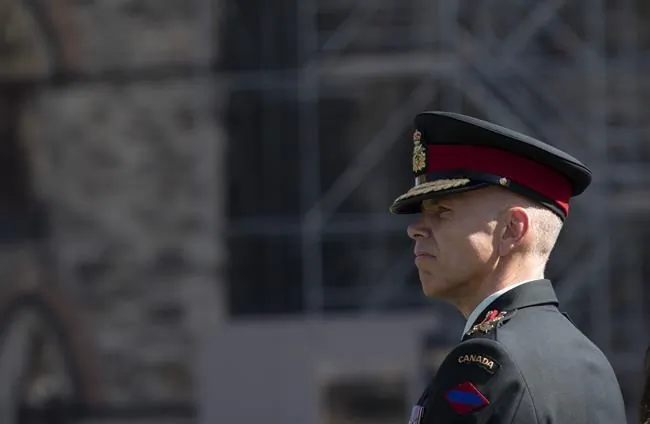 Lieutenant-General Wayne Eyre listens to speakers during a change of command parade for the Canadian Army on Parliament Hill on August 20, 2019 in Ottawa. Acting chief of the defence staff Lt.-Gen. Eyre says he has asked for military officials to develop a "play book" for handling future misconduct allegations against senior officers. (Adrian Wyld / The Canadian Press)