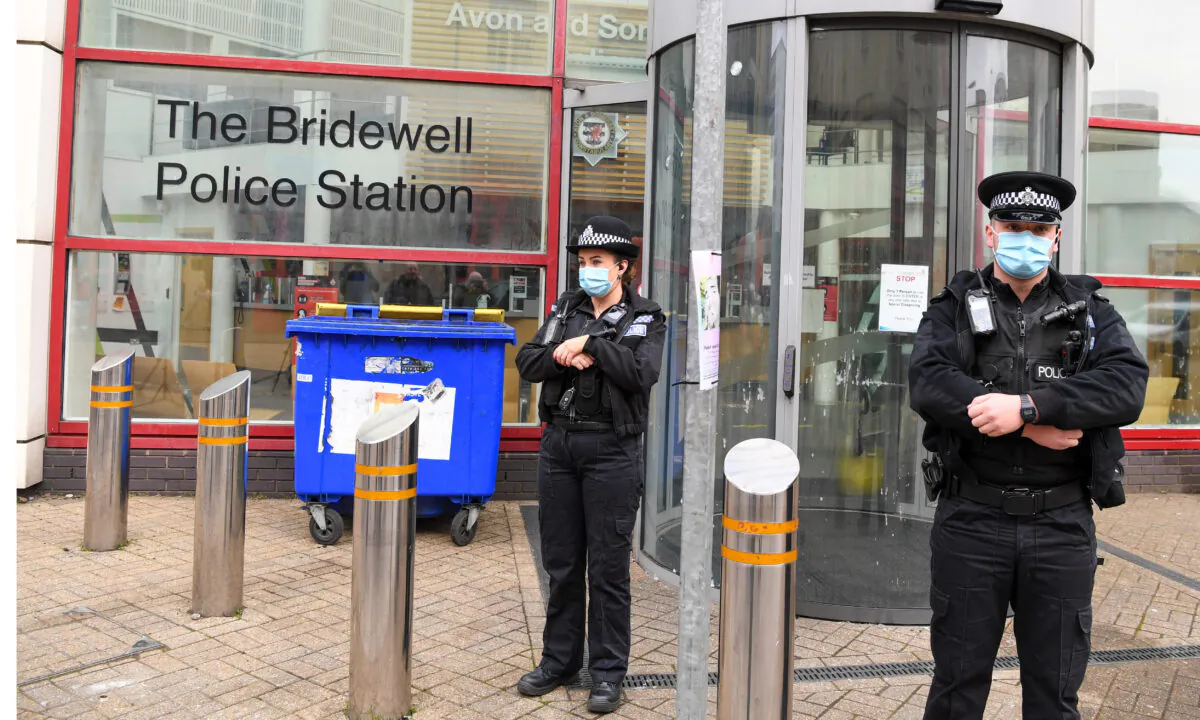 Police outside of Bridewell Police station in Bristol, England, on March 22, 2021. (Finnbarr Webster/Getty Images)