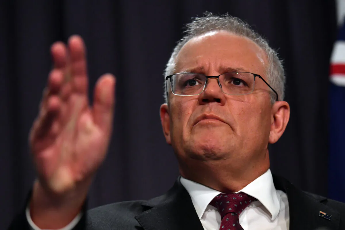 CANBERRA, AUSTRALIA - MARCH 23: Prime Minister Scott Morrison tears up during a press conference at Parliament House on March 23, 2021 in Canberra, Australia. 

Sam Mooy/Getty Images