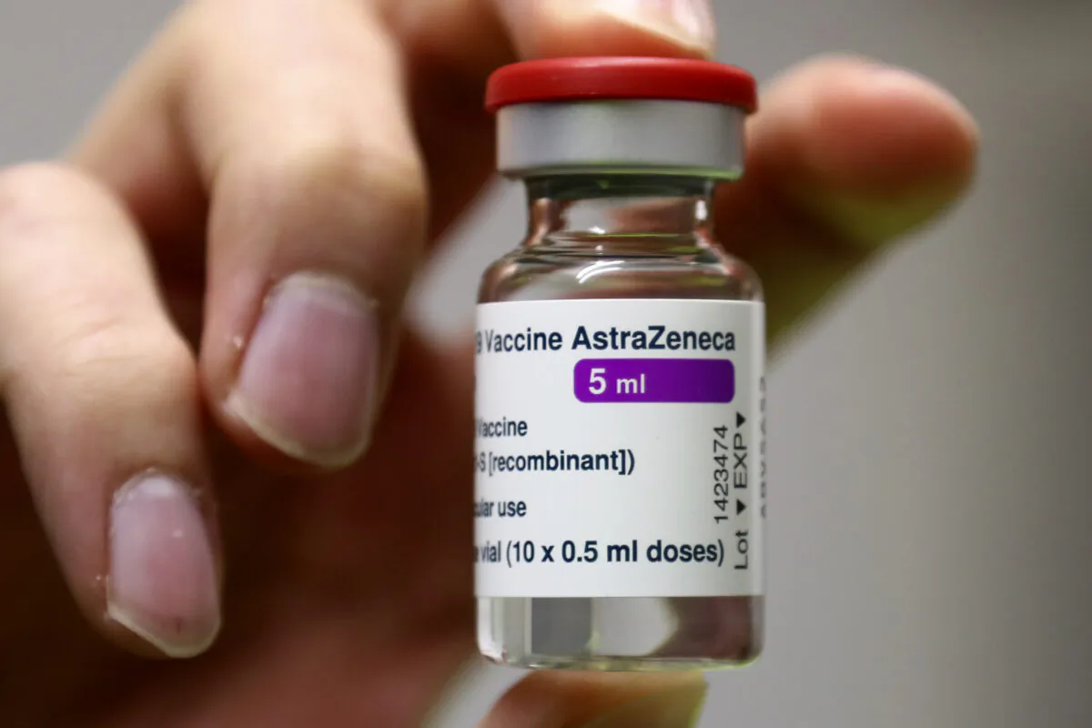 Medical staff prepares an AstraZeneca COVID-19 vaccine at a vaccine center in Ebersberg near Munich, Germany on March 22, 2021. (Matthias Schrader/AP Photo)