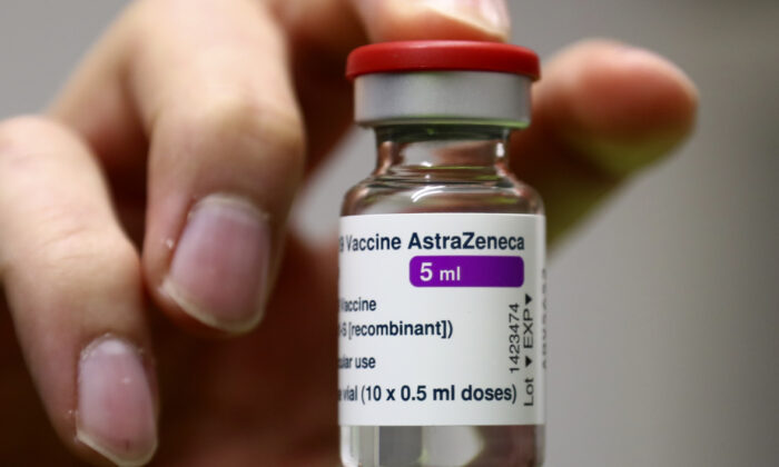 Medical staff prepares an AstraZeneca COVID-19 vaccine at a vaccine center in Ebersberg near Munich, Germany on March 22, 2021. (Matthias Schrader/AP Photo)