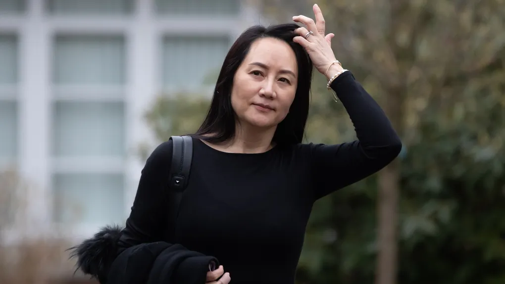 Meng Wanzhou, chief financial officer of Huawei, leaves her home to attend a hearing at B.C. Supreme Court in Vancouver on March 23, 2021. (Darryl Dyck/The Canadian Press)