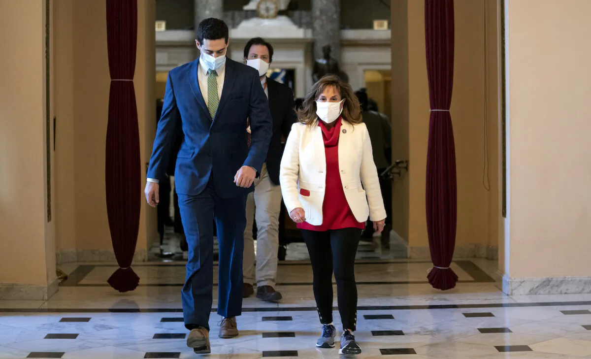 Rep. Lisa McClain (R-Mich.) walks to the House floor at the U.S. Capitol in Washington on Jan. 13, 2021. (Stefani Reynolds/Getty Images)