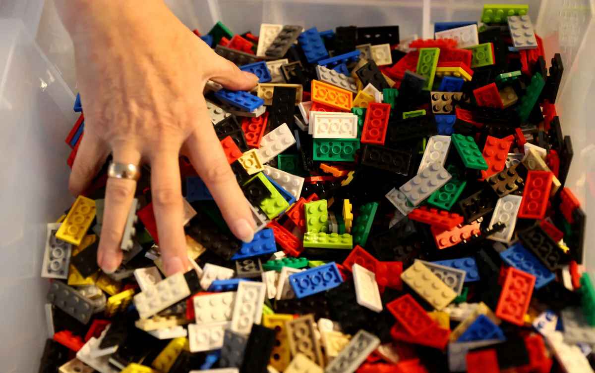 Rita Ebel, nicknamed "Lego grandma," builds a wheelchair ramp from donated Lego bricks in the living room of her flat in Hanau, Germany, on Feb. 17, 2020. (Kai Pfaffenbach/Reuters)