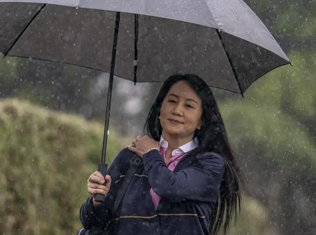 Chief Financial Officer of Huawei, Meng Wanzhou leaves her home in Vancouver, on March 24, 2021 to go to B.C. Supreme Court. (Jonathan Hayward/The Canadian Press)