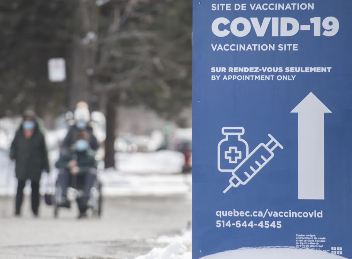 People at a COVID-19 vaccination site in Montreal on March 14, 2021. (Graham Hughes/The Canadian Press)