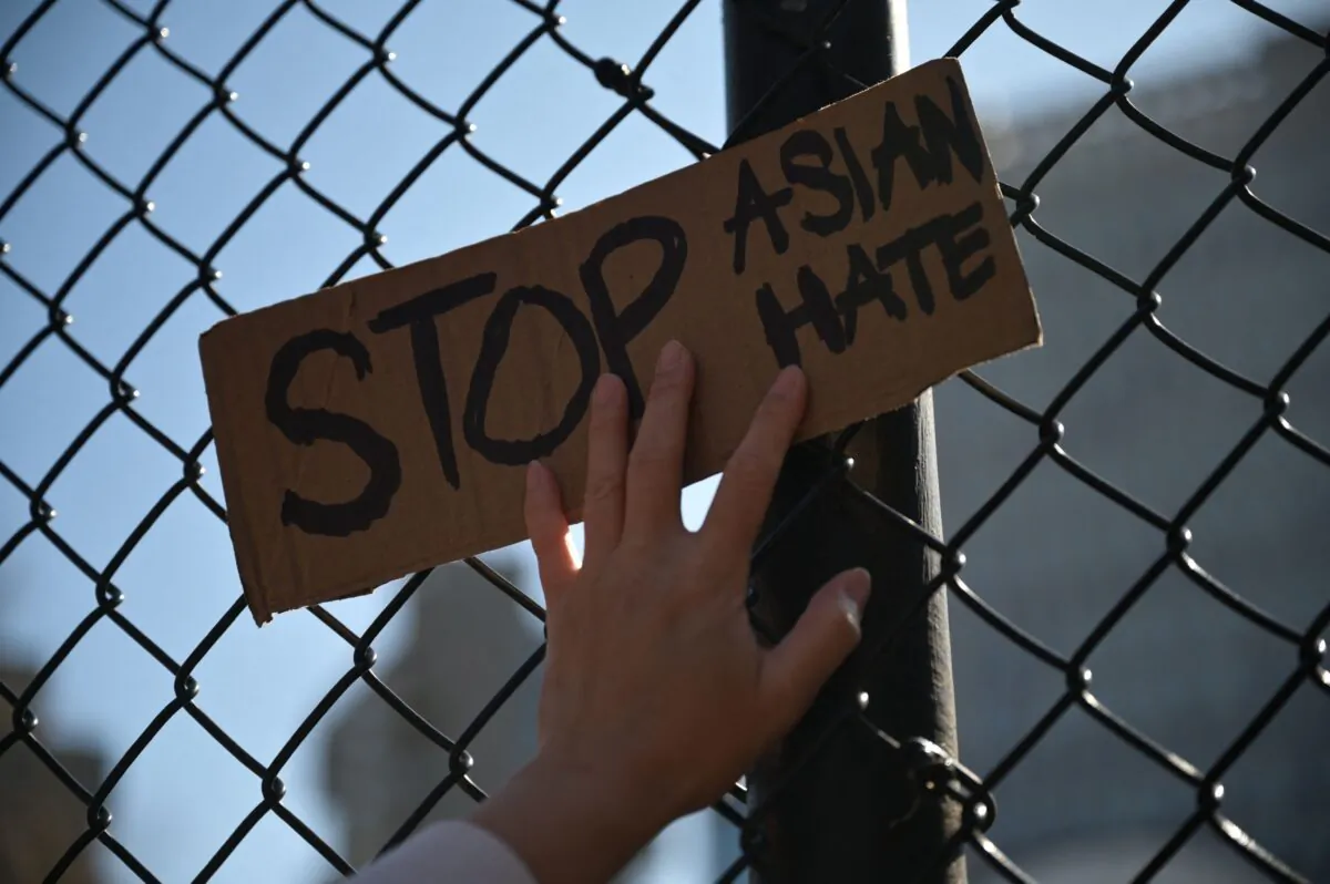 People attend a "rally against hate" at Columbus Park in New York City on March 21, 2021, after three massage parlors around Atlanta were targeted on March 16 and a suspect was arrested. (Ed Jones/AFP via Getty Images)