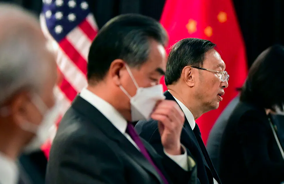 The Chinese delegation led by Yang Jiechi (C), director of the Central Foreign Affairs Commission Office and Wang Yi (2nd L), China's Foreign Minister, speak with their US counterparts at the opening session of US-China talks at the Hotel Captain Cook in Anchorage, Alaska on March 18, 2021. (FREDERIC J. BROWN/POOL/AFP via Getty Images)