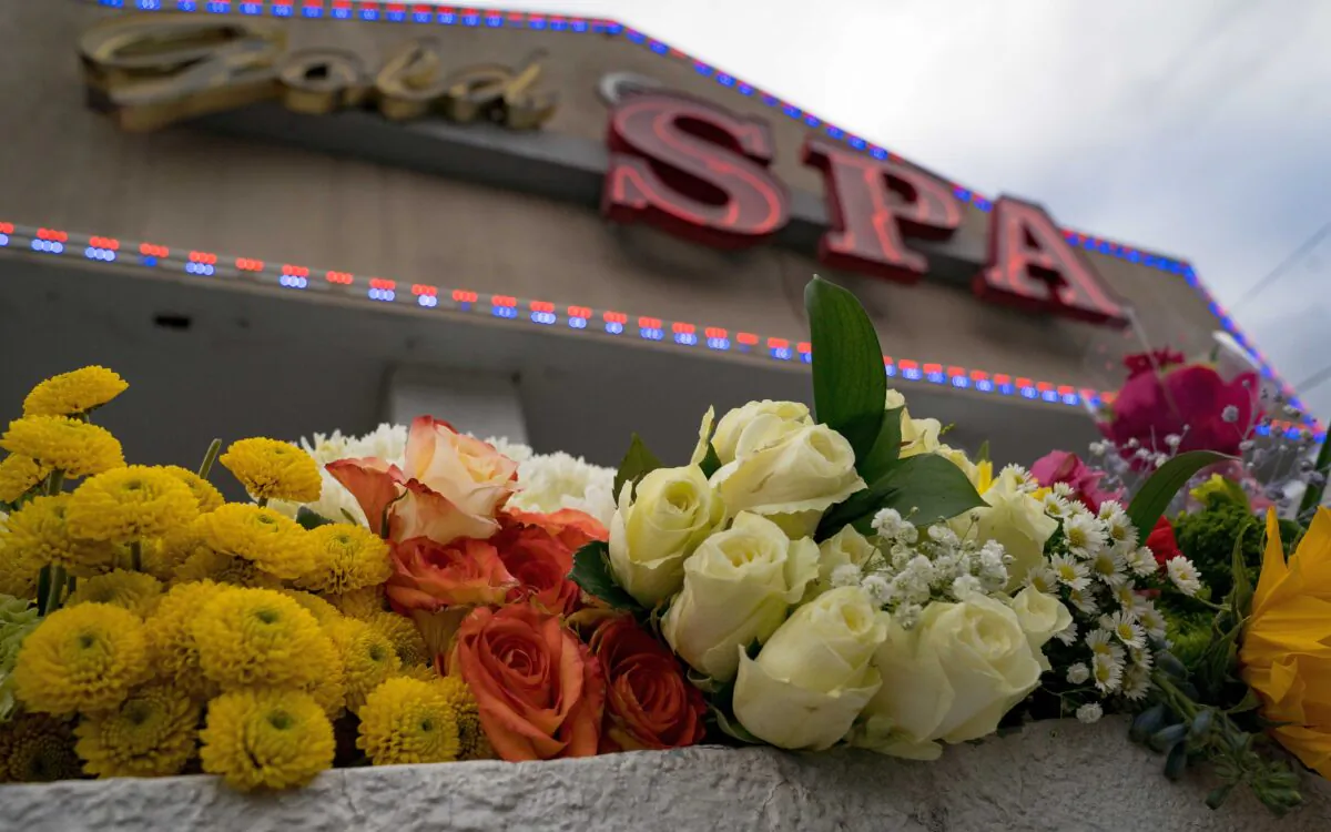 Flowers adorn Gold Spa during a demonstration against violence following the March 16 shooting in which three women were killed in Atlanta on March 18, 2021. (Megan Varner/Getty Images)