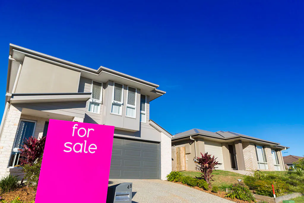 Property sales signage is displayed in North Lakes on June 10, 2016 in Brisbane, Australia. (Glenn Hunt/Getty Images)