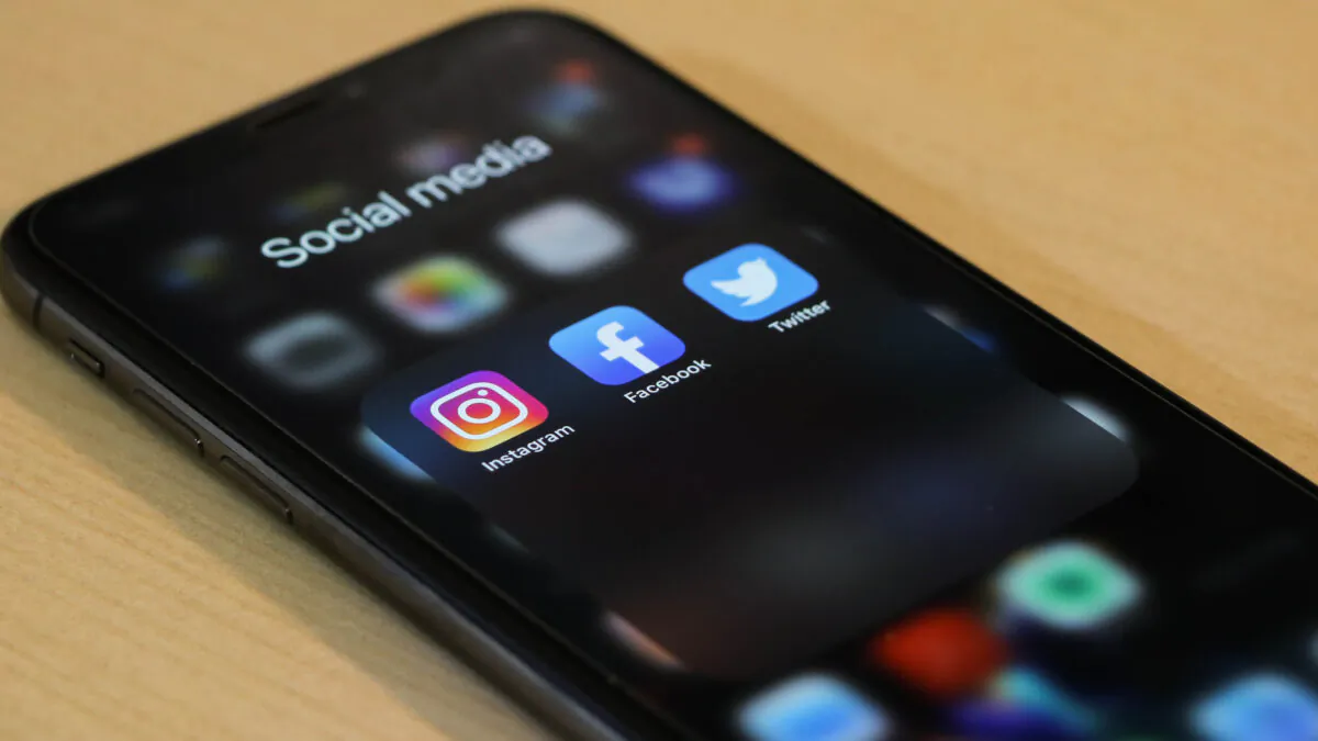 Social media apps are displayed on a phone in this file photo. (dole777/Unsplash)