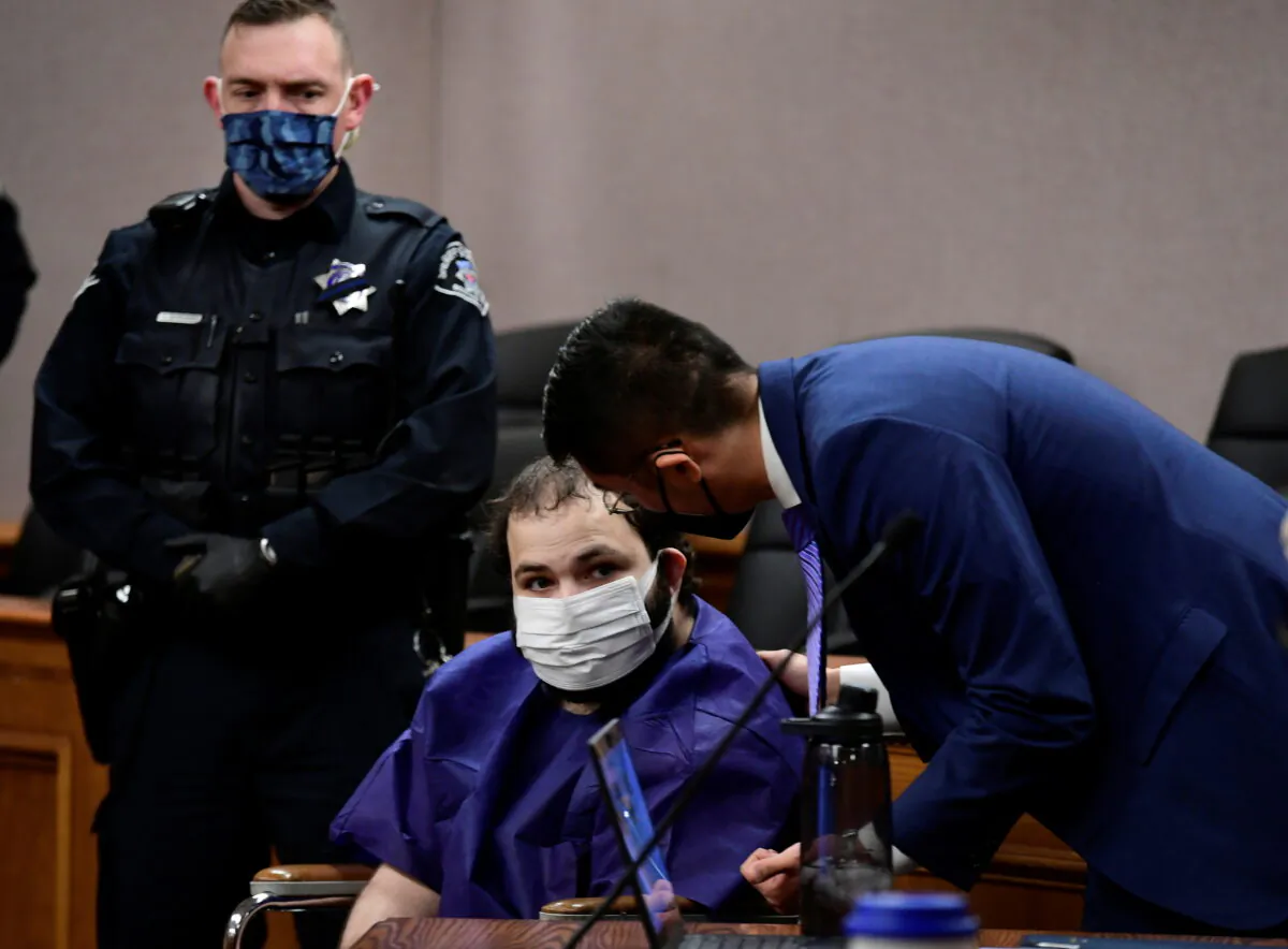 King Soopers shooting suspect Ahmad Al Aliwi Alissa, 21, appears before Boulder District Court Judge Thomas Mulvahill at the Boulder County Justice Center in Boulder, Colo., on March 25, 2021. (Helen H. Richardson/The Denver Post/Pool via Reuters)