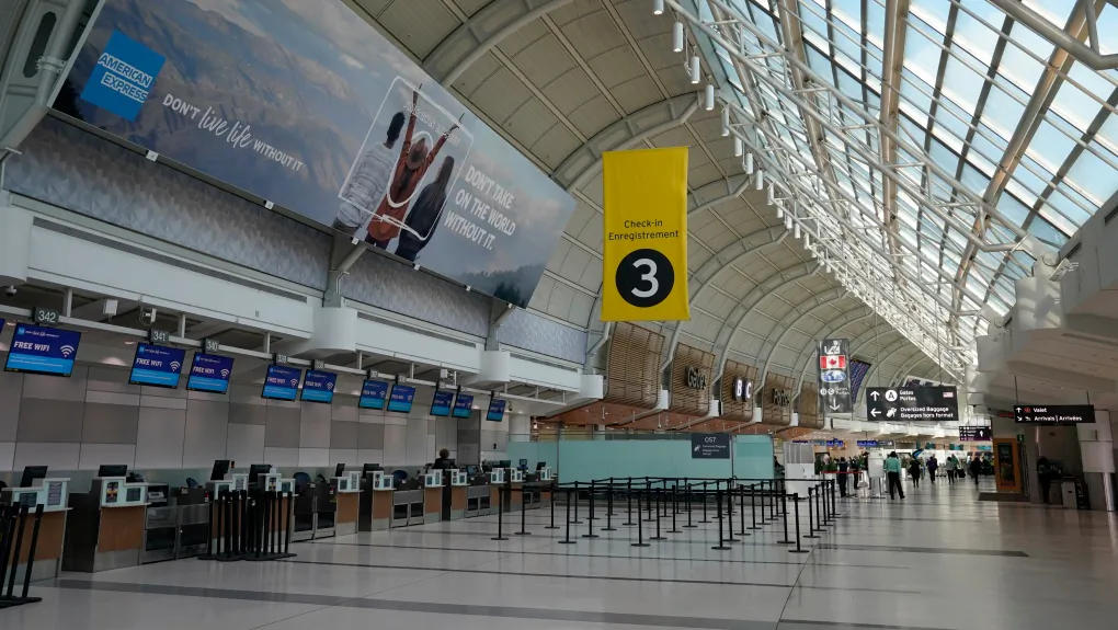 An almost-empty Terminal 3 is shown at Pearson International Airport in Toronto, on March 13, 2020. (Frank Gunn/The Canadian Press)
