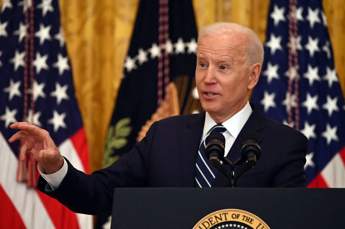 President Joe Biden answers a question during his first press briefing in the East Room of the White House in Washington on March 25, 2021. (Jim Watson/AFP via Getty Images)