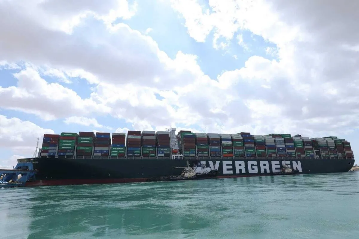 The Ever Given, a Panama-flagged cargo ship on March 26, 2021, after it became wedged across the Suez Canal and blocked traffic in the vital waterway. (Suez Canal Authority via AP)