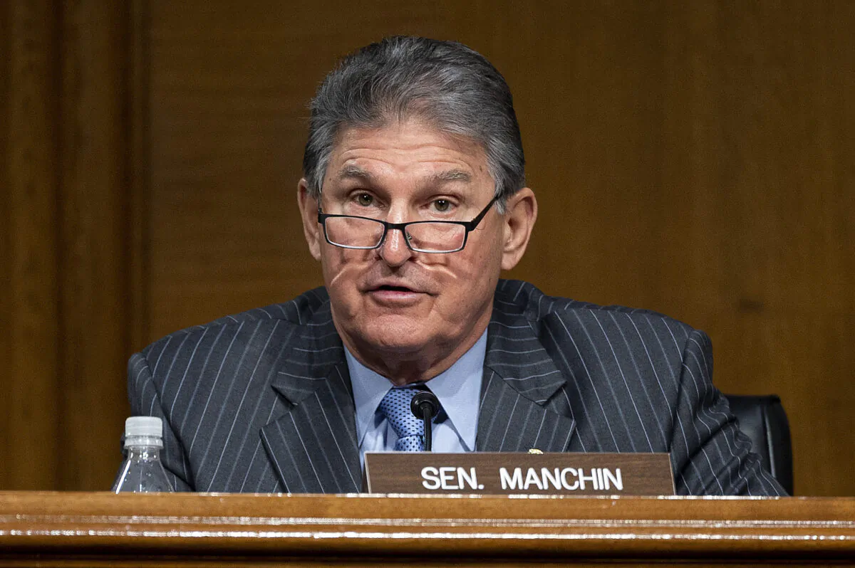 Ranking Member Joe Manchin (D-W.Va.) speaks during a hearing to examine the nomination of former Michigan Gov. Jennifer Granholm to be Secretary of Energy, on Capitol Hill in Washington on Jan. 27, 2021. (Jim Watson/POOL/AFP via Getty Images)