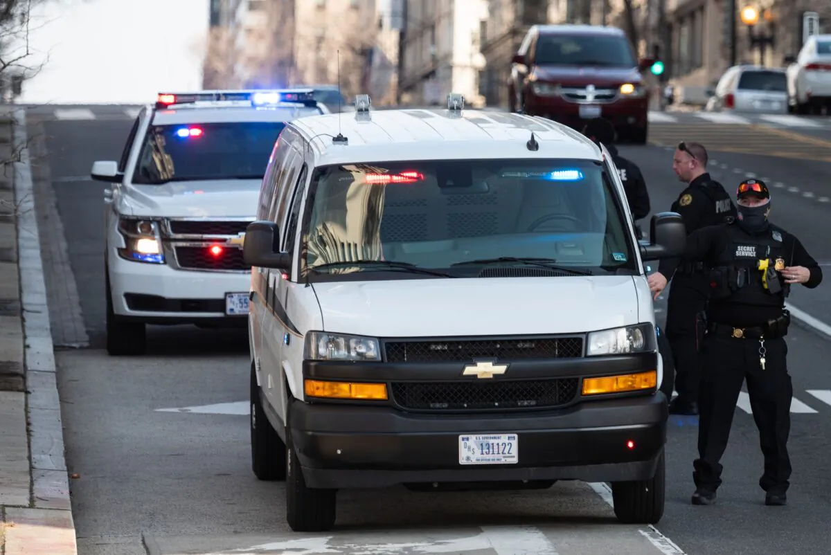 Members of the U.S. Secret Service take up a position on a street corner near the White House in Washington on March 4, 2021. (Andrew Caballero-Reynolds/AFP via Getty Images)