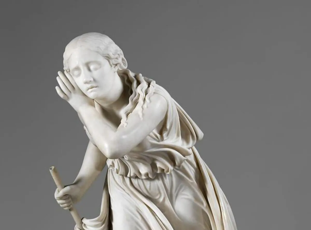 A detail from “Nydia, the Blind Flower Girl of Pompeii,” 1853--54, by Randolph Rogers.
Carrara marble; 36 1⁄8 inches by 17 1⁄4 inches by 25 1⁄4 inches. Metropolitan Museum of Art, New York. (Public Domain) 