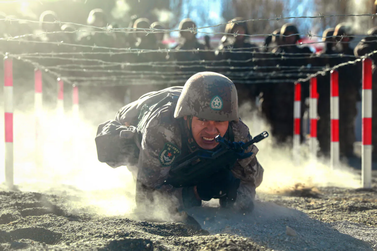 Chinese People's Liberation Army (PLA) soldiers taking part in military training in the Pamir Mountains in Kashgar, in China's Xinjiang region, on Jan. 4, 2021.  (STR/AFP via Getty Images)