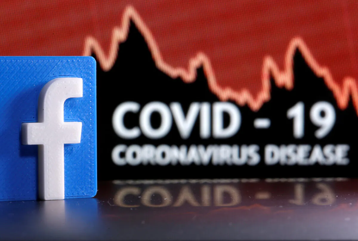 A 3D-printed Facebook logo is seen in front of displayed coronavirus disease words in this illustration taken on March 24, 2020. (Dado Ruvic/Reuters)