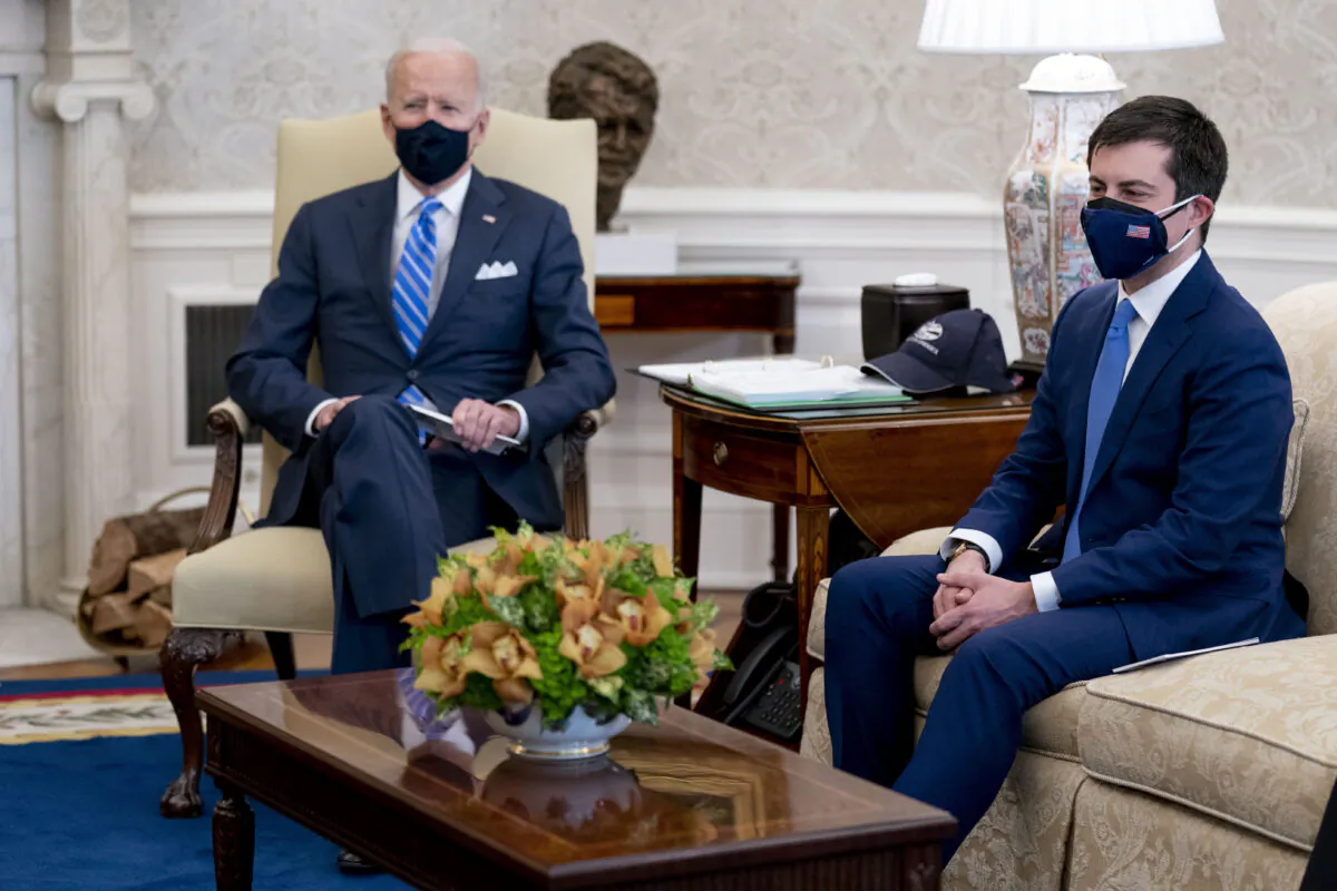 Transportation Secretary Pete Buttigieg (R) meets with President Joe Biden in the White House's Oval Office in Washington on March 4, 2021. (Andrew Harnik/AP Photo)