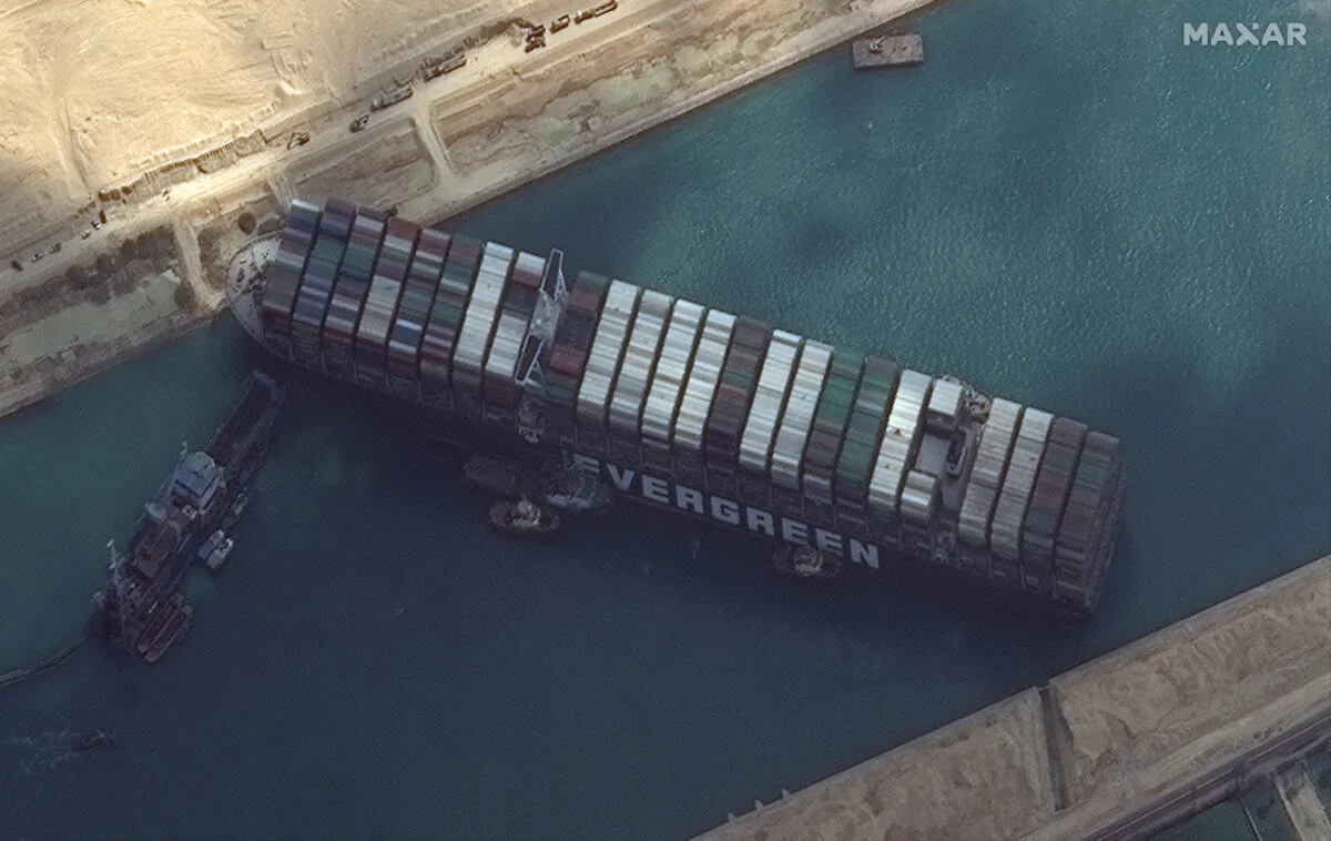 This satellite image from Maxar Technologies shows the cargo ship MV Ever Given stuck in the Suez Canal near Suez, Egypt, March 26, 2021. (Maxar Technologies via AP)