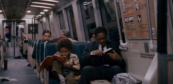black boy and father on subway
