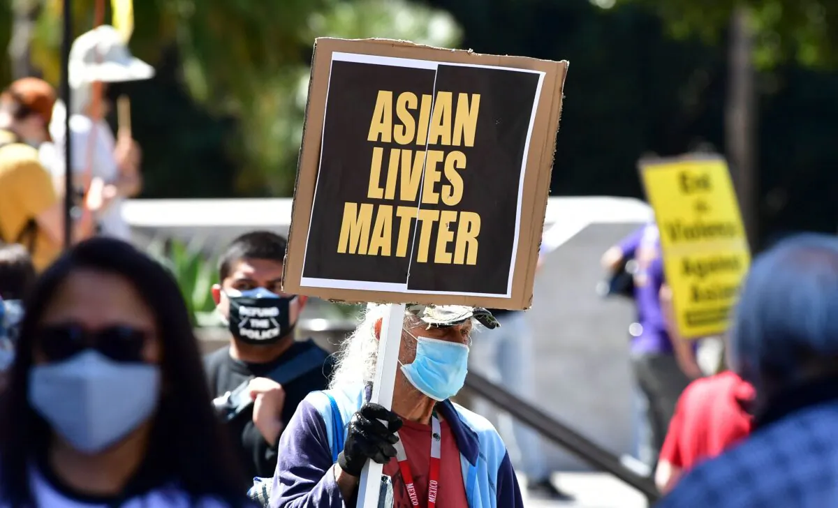 Activists gather for a demonstration at City Hall in Los Angeles on March 27, 2021, denouncing anti-Asian American and Pacific Islander sentiment and hate. (Fredric J. Brown/AFP via Getty Images)