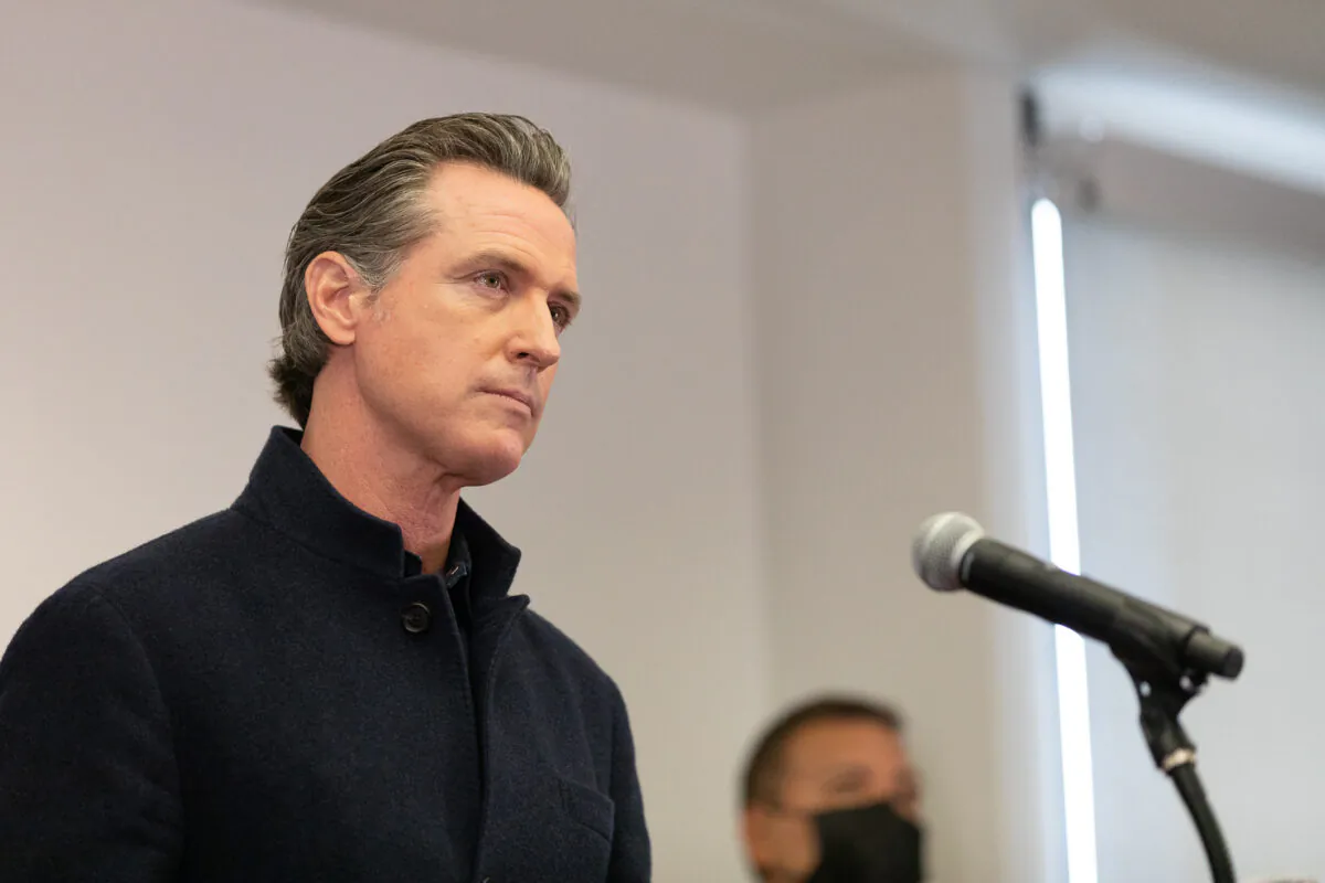 Gov. Gavin Newsom speaks to reporters at AltaMed Urgent Care in Santa Ana, Calif., on March 25, 2021. (John Fredricks/The Epoch Times)