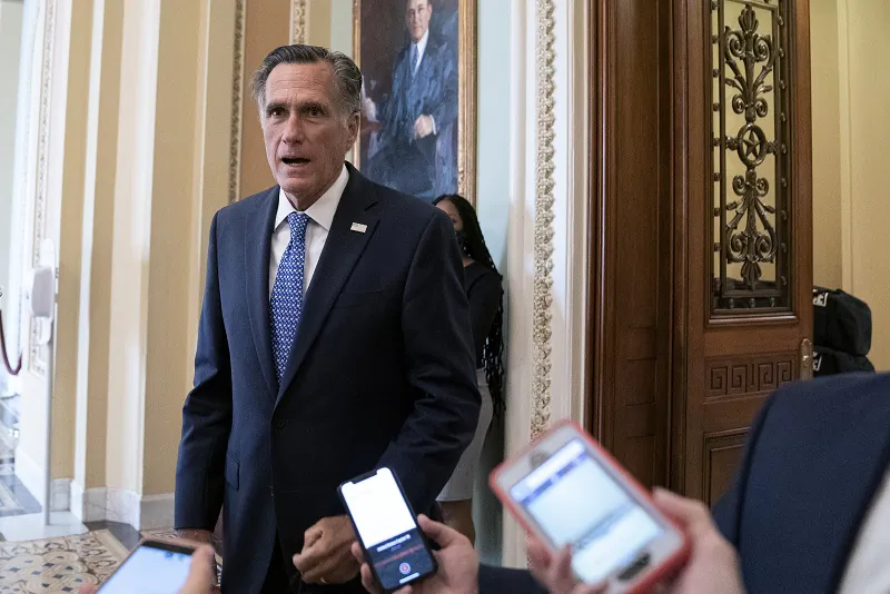 Sen. Mitt Romney (R-Utah) speaks to reporters at the U.S. Capitol in Washington on Sept. 21, 2020. (Stefani Reynolds/Getty Images)