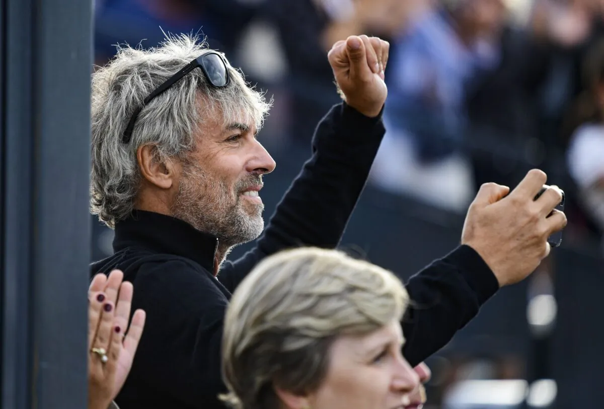 PPF's main shareholder Petr Kellner watches as his daughter Anna Kellnerova and horse Catch Me If You Can Old compete during the equestrian CET Prague Cup, CSIO Grand Prix, in Prague, Czech Republic, on Aug. 23, 2020. (Roman Vondrous/CTK via AP)