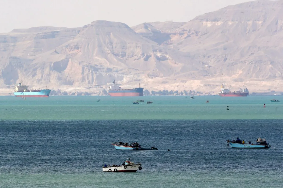 Ships and boats are seen at the entrance of Suez Canal, which was blocked by stranded container ship Ever Given that ran aground, Egypt, on March 28, 2021. (Mohamed Abd El Ghany/Reuters)