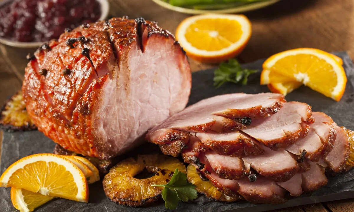 The alcohol in this bourbon-spiked glaze burns off when you cook it, leaving behind smoky, honeyed notes that complement the apricot and maple syrup. (Brent Hofacker/shutterstock)