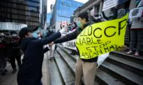 Man Holding Sign Calling for CCP Accountability Is Blocked at Vancouver Anti-Asian Hate Event Organized by Mysterious Group