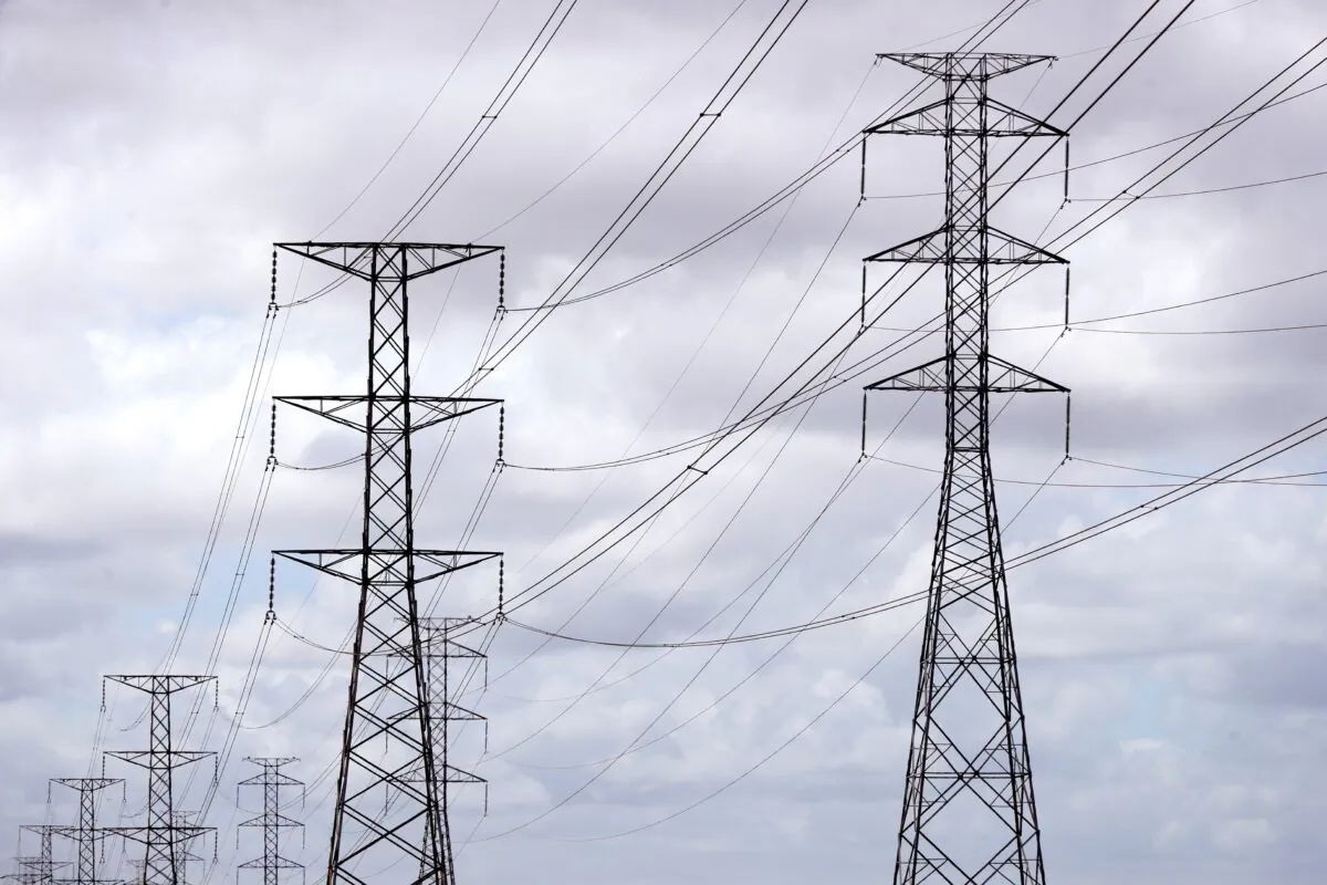 Power lines at the AGL Power Station at Torrens Island in Adelaide, Nov. 4, 2019. (AAP Image/Kelly Barnes) 