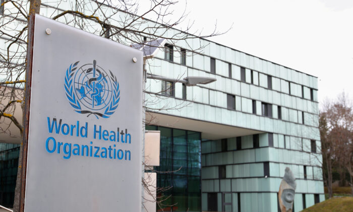 A logo is pictured outside a building of the  World Health Organization (WHO) during an executive board meeting on update on the CCP virus outbreak, in Geneva, Switzerland, Feb. 6, 2020. (Denis Balibouse/Reuters)