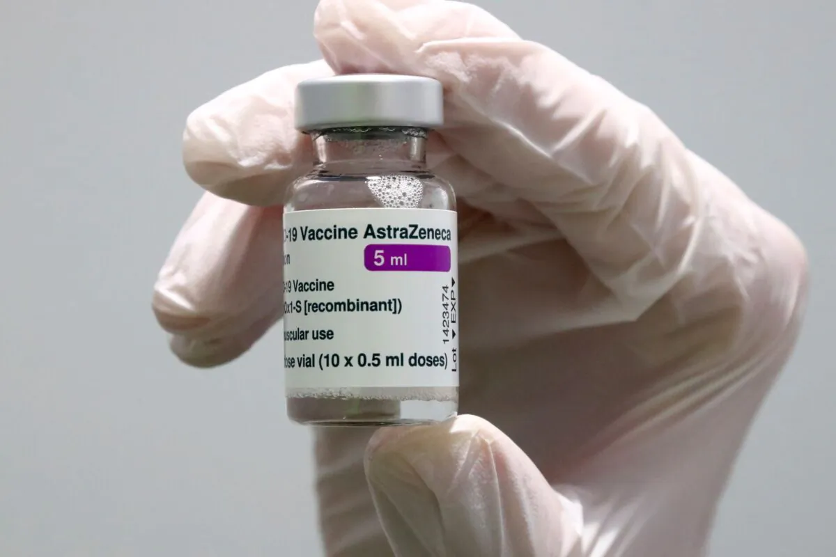 A medical worker prepares an AstraZeneca COVID-19 vaccine during preparations at the vaccine center in Ebersberg near Munich, Germany, on March 22, 2021. (Matthias Schrader/AP Photo)
