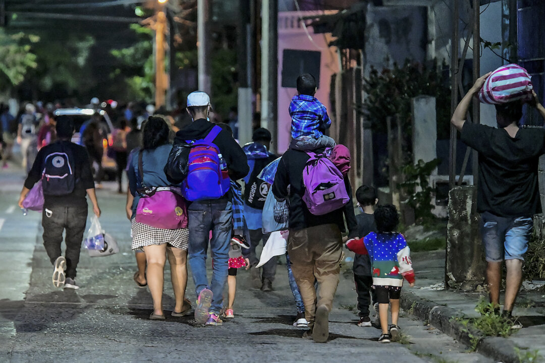 EXCLUSIVE: Illegal Migrants Explain Why They’re Coming to the US as They Cross Private Land