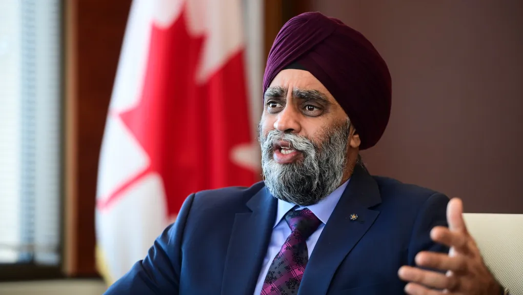 Minister of National Defence Harjit Sajjan takes part in a year-end interview with The Canadian Press at National Defence Headquarters in Ottawa on Dec. 17, 2020. (Sean Kilpatrick/The Canadian Press)