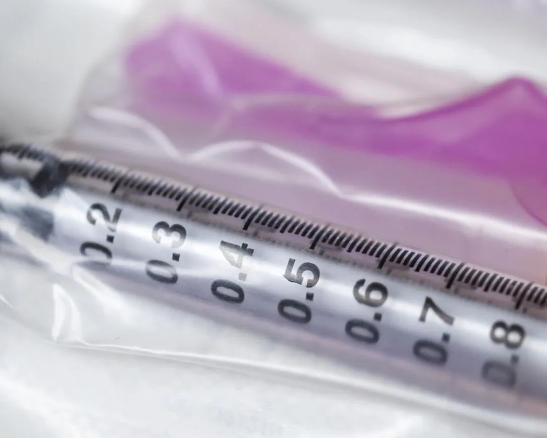 A needle and syringe used to administer the flu shot is displayed in Virgil, Ont., on October 5, 2020. The 2021 flu season will go down in history as the epidemic that never was. (Tara Walton / The Canadian Press)