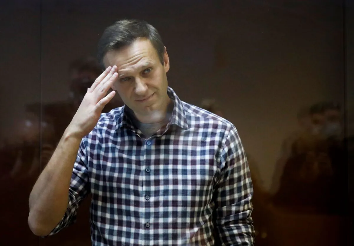 Russian opposition leader Alexei Navalny stands in a cage in the Babuskinsky District Court in Moscow, Russia, on Feb. 20, 2021. (Alexander Zemlianichenko/AP Photo File)