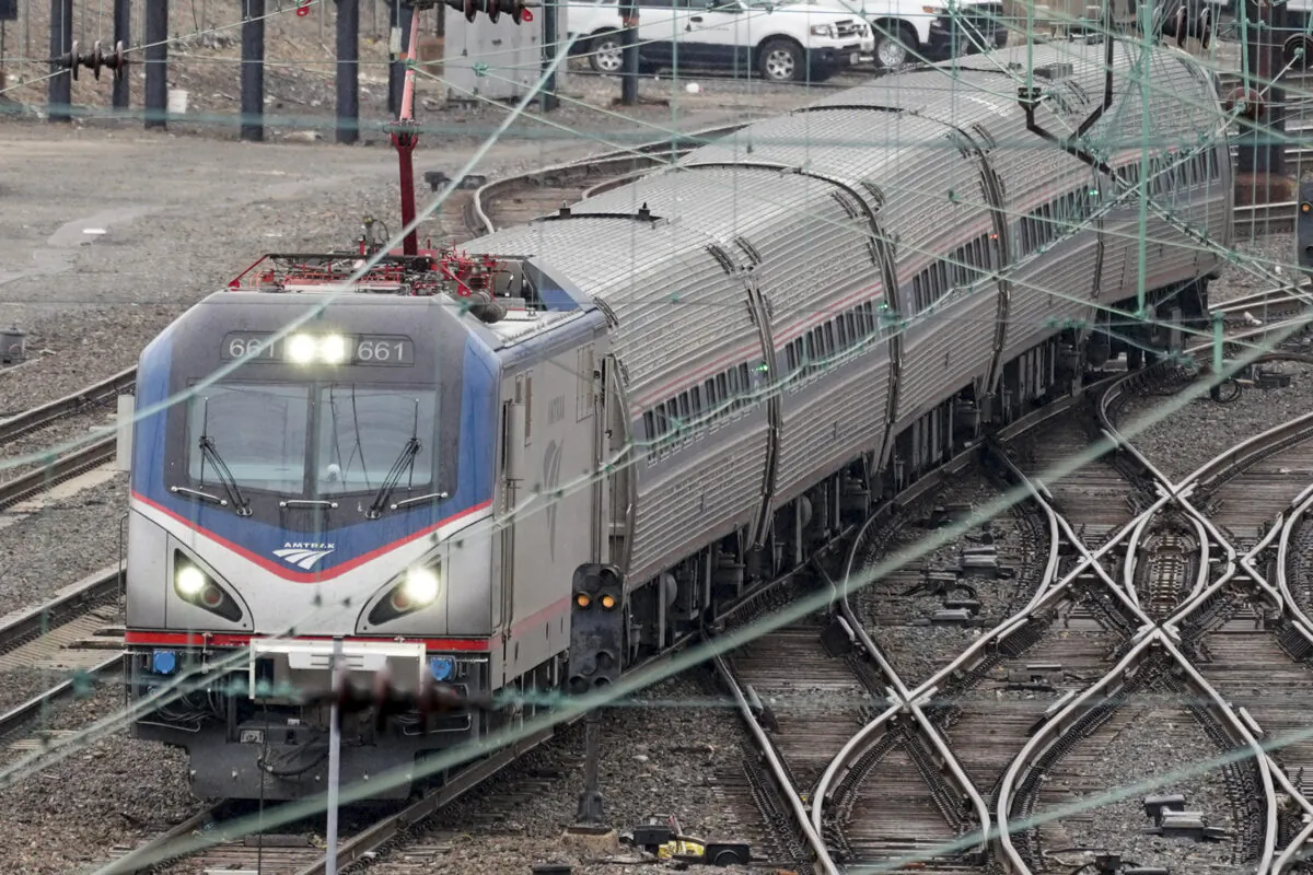 An Amtrak train departs 30th Street Station in Philadelphia on March 31, 2021. (Matt Rourke/AP Photo)