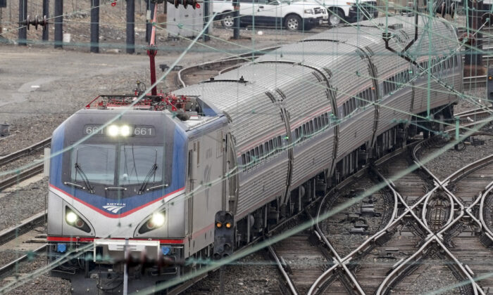 An Amtrak train departs 30th Street Station in Philadelphia on March 31, 2021. (Matt Rourke/AP Photo)