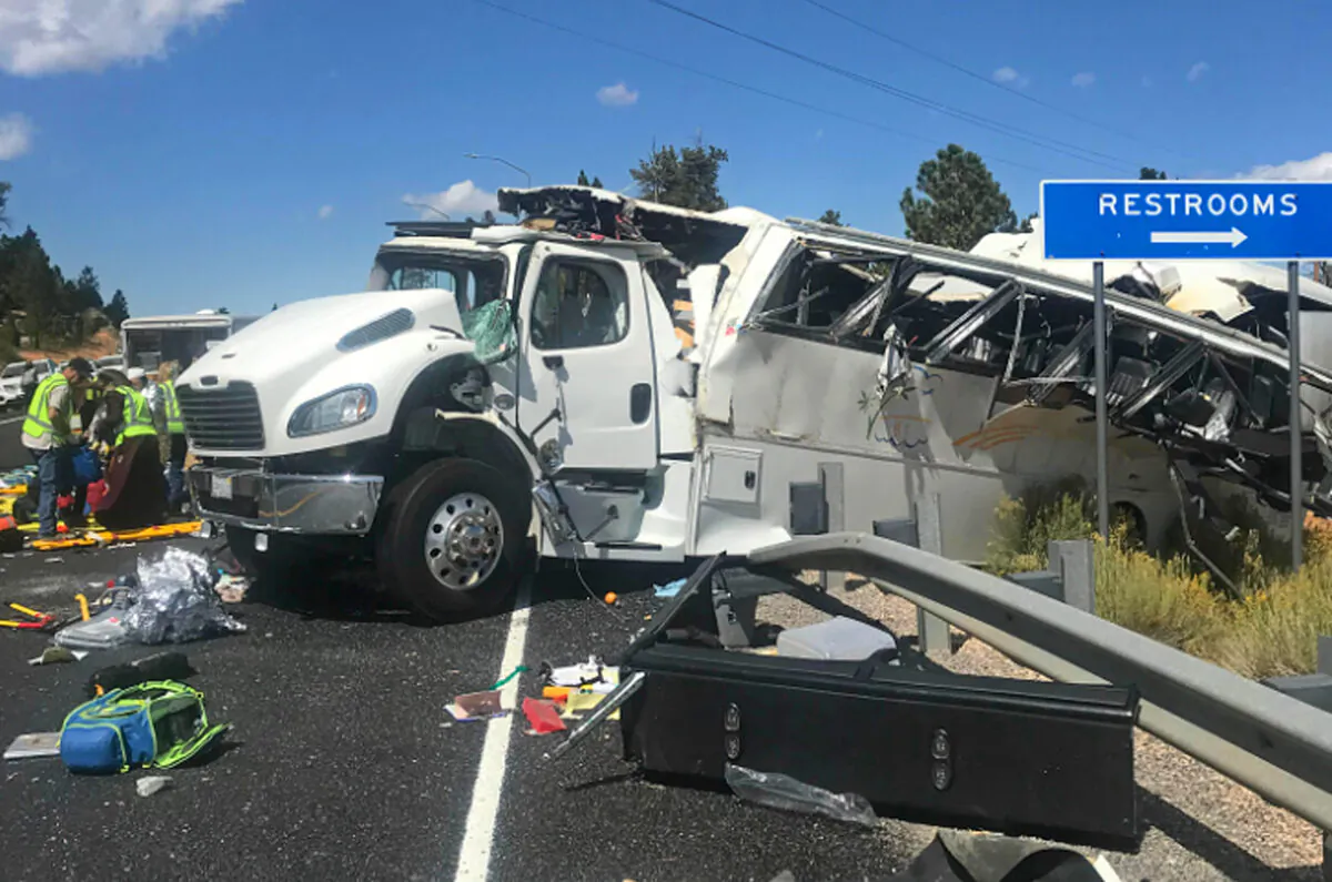 This photo released by the Garfield County Sheriff's Office shows a tour bus that crashed near Bryce Canyon National Park in southern Utah on Sept. 20, 2019. (Sheriff Danny Perkins/Garfield County Sheriff's Office via AP, File)