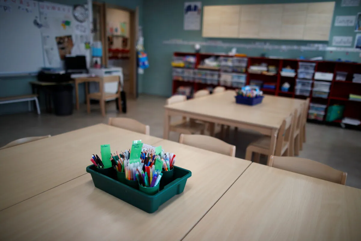 Tables and chairs in a closed classroom at the private primary school Jeanne D'Arc in Saint-Maur-des-Fosses, near Paris, amid the coronavirus disease (COVID-19) outbreak in France, on March 30, 2021. (Gonzalo Fuentes/Reuters)
