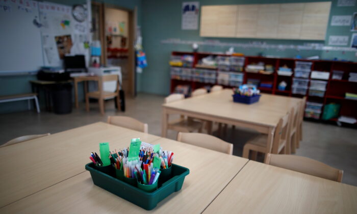 Tables and chairs in a closed classroom at the private primary school Jeanne D'Arc in Saint-Maur-des-Fosses, near Paris, amid the coronavirus disease (COVID-19) outbreak in France, on March 30, 2021. (Gonzalo Fuentes/Reuters)