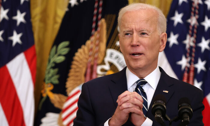 President Joe Biden talks to reporters during the first news conference of his presidency in the East Room of the White House in Washington on March 25, 2021. (Chip Somodevilla/Getty Images)